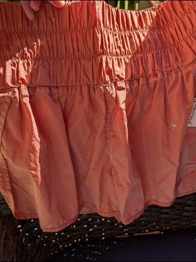 Free People Movement Women's Rust Orange Shorts.